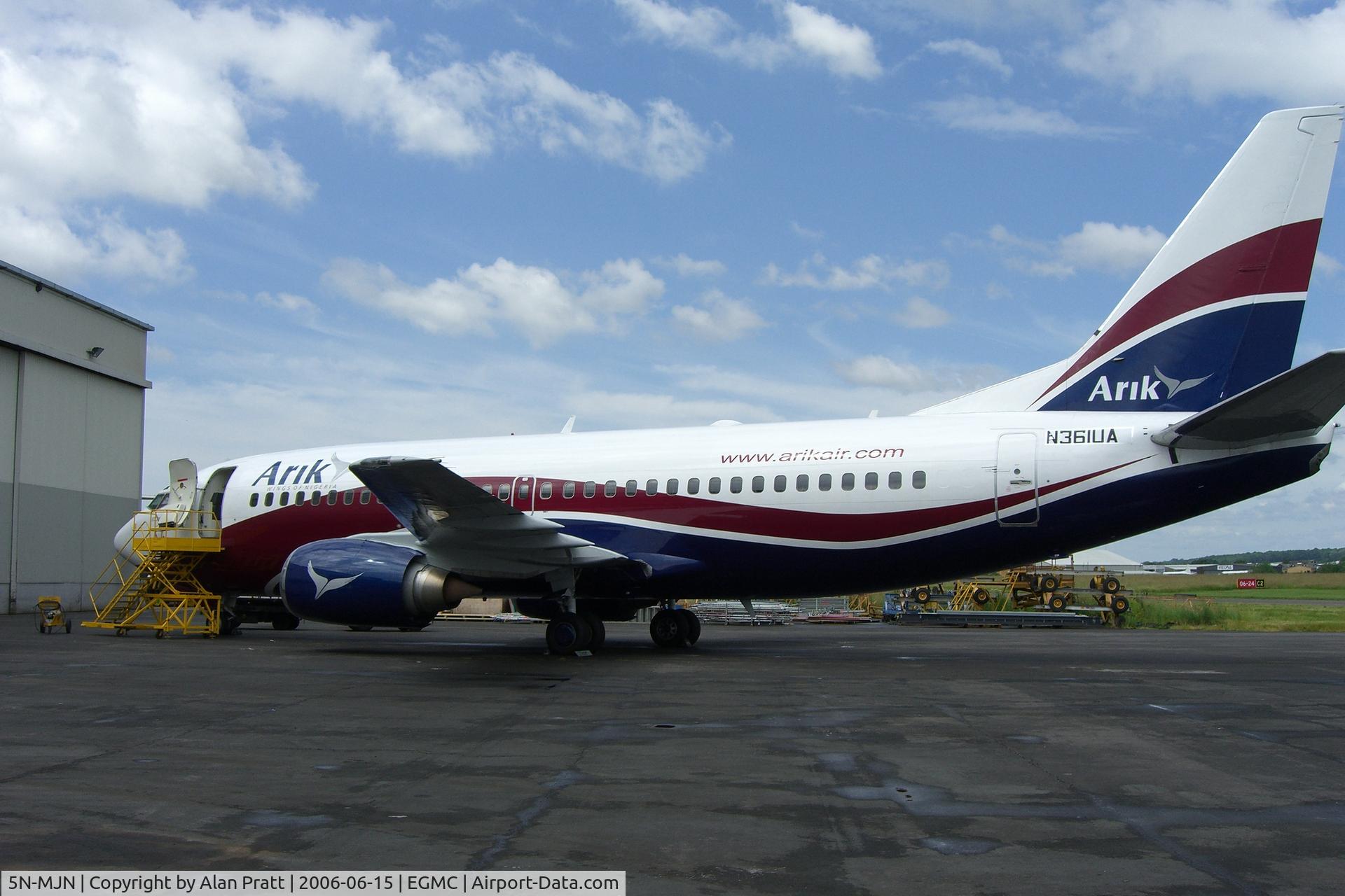 5N-MJN, 2009 Boeing 737-86N C/N 35638, carrying reg JA on nosewheel bay door  and name EDDINGTON and temporary reg N361UA