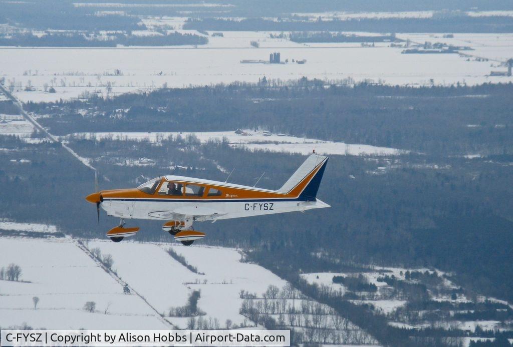 C-FYSZ, 1969 Piper PA-28-180 Cherokee C/N 28-5205, YSZ in flight just east of Ottawa, Ontario