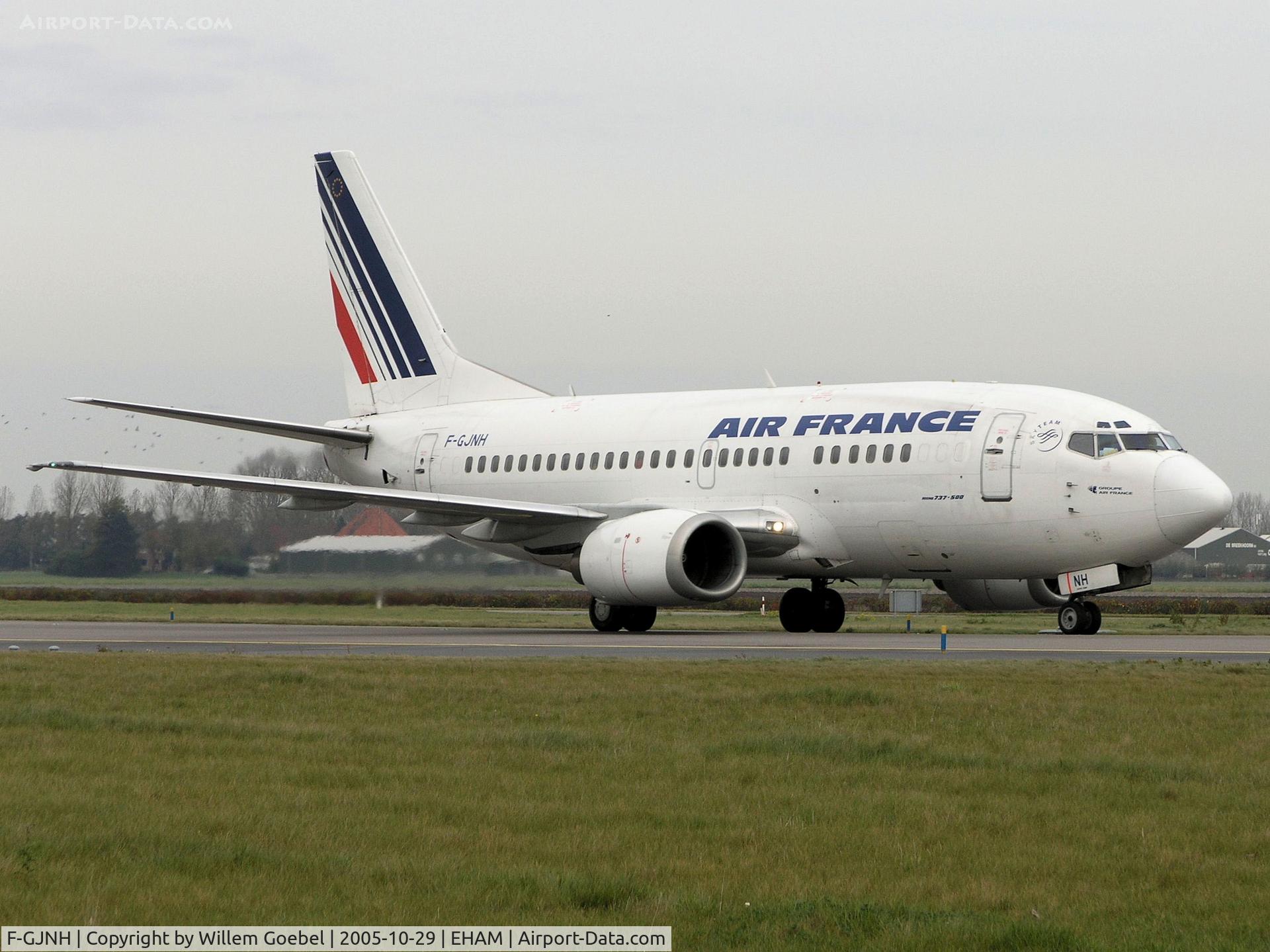 F-GJNH, Boeing 737-528 C/N 25233, Taxi to the gate off Schiphol Airport