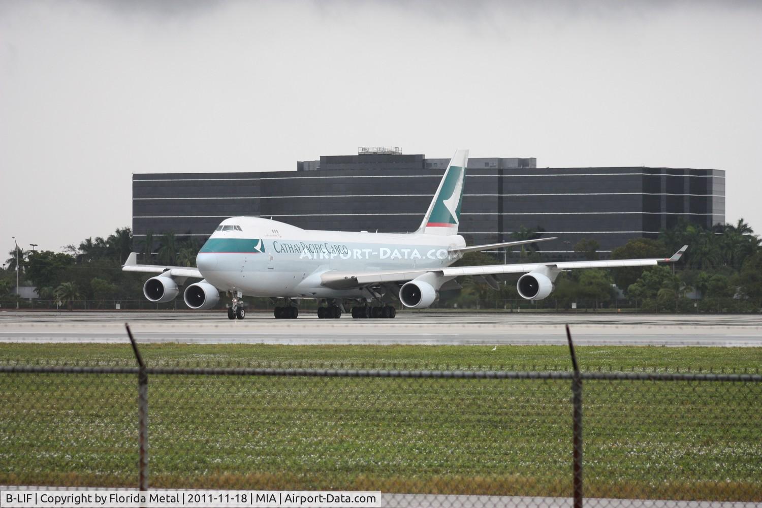 B-LIF, 2009 Boeing 747-467ERF C/N 36871, Cathay Cargo 747 getting ready to depart after rain shower went through