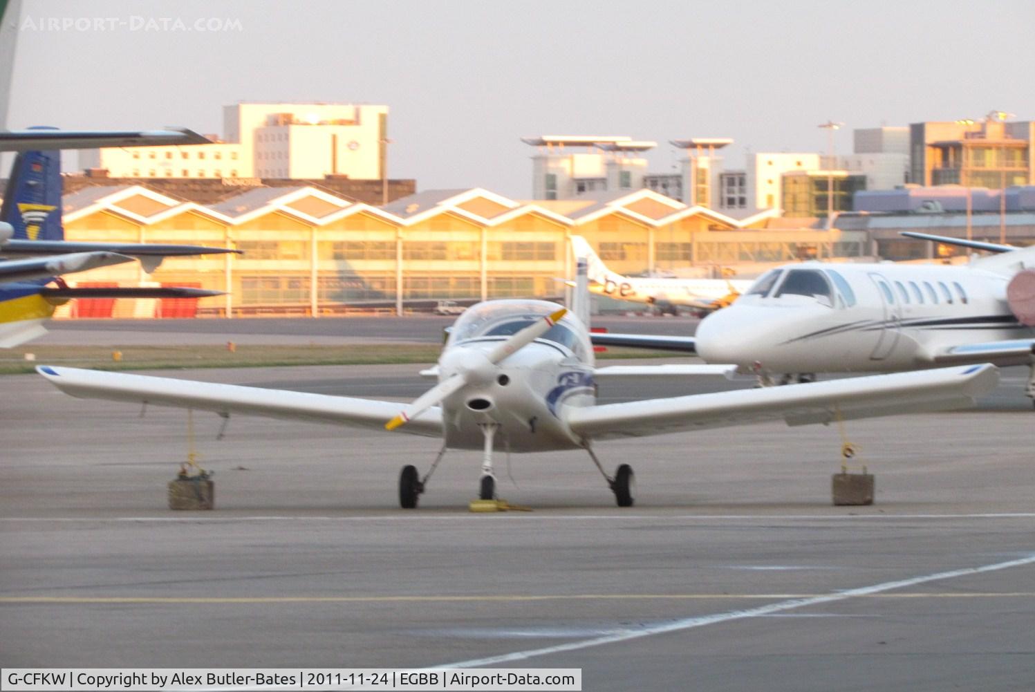 G-CFKW, 2008 Alpi Aviation Pioneer 200-M C/N LAA 334-14828, Parked and waiting to be towed around to the NEC to exhibit