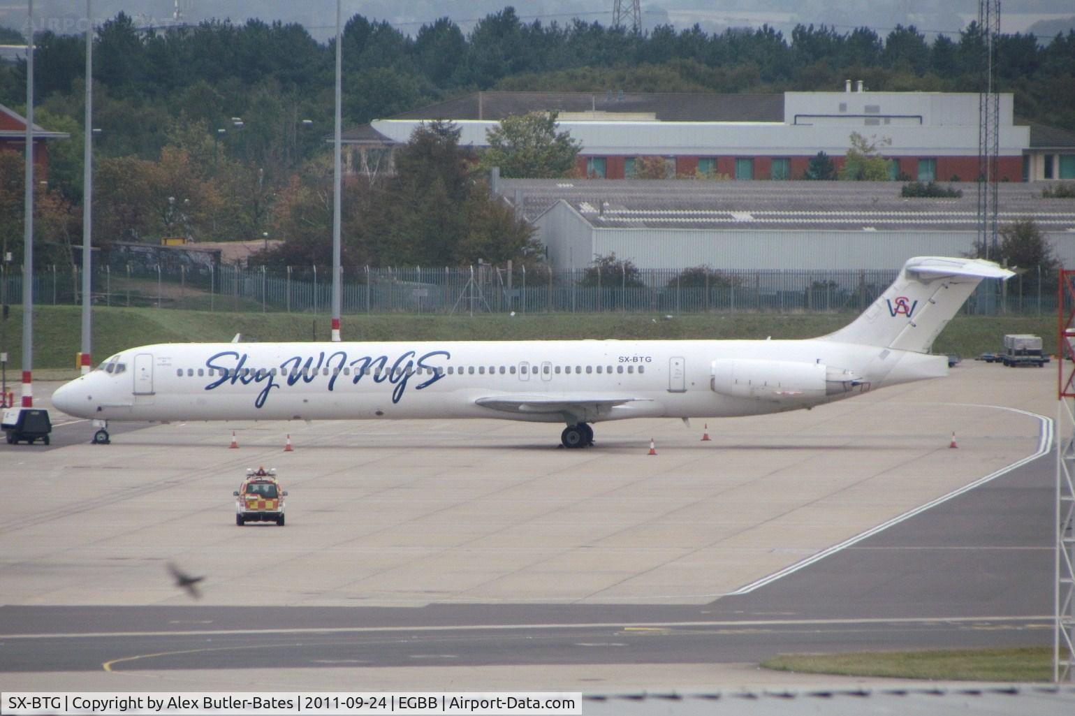 SX-BTG, 1989 McDonnell Douglas MD-83 (DC-9-83) C/N 49856/1675, Parked at a stand