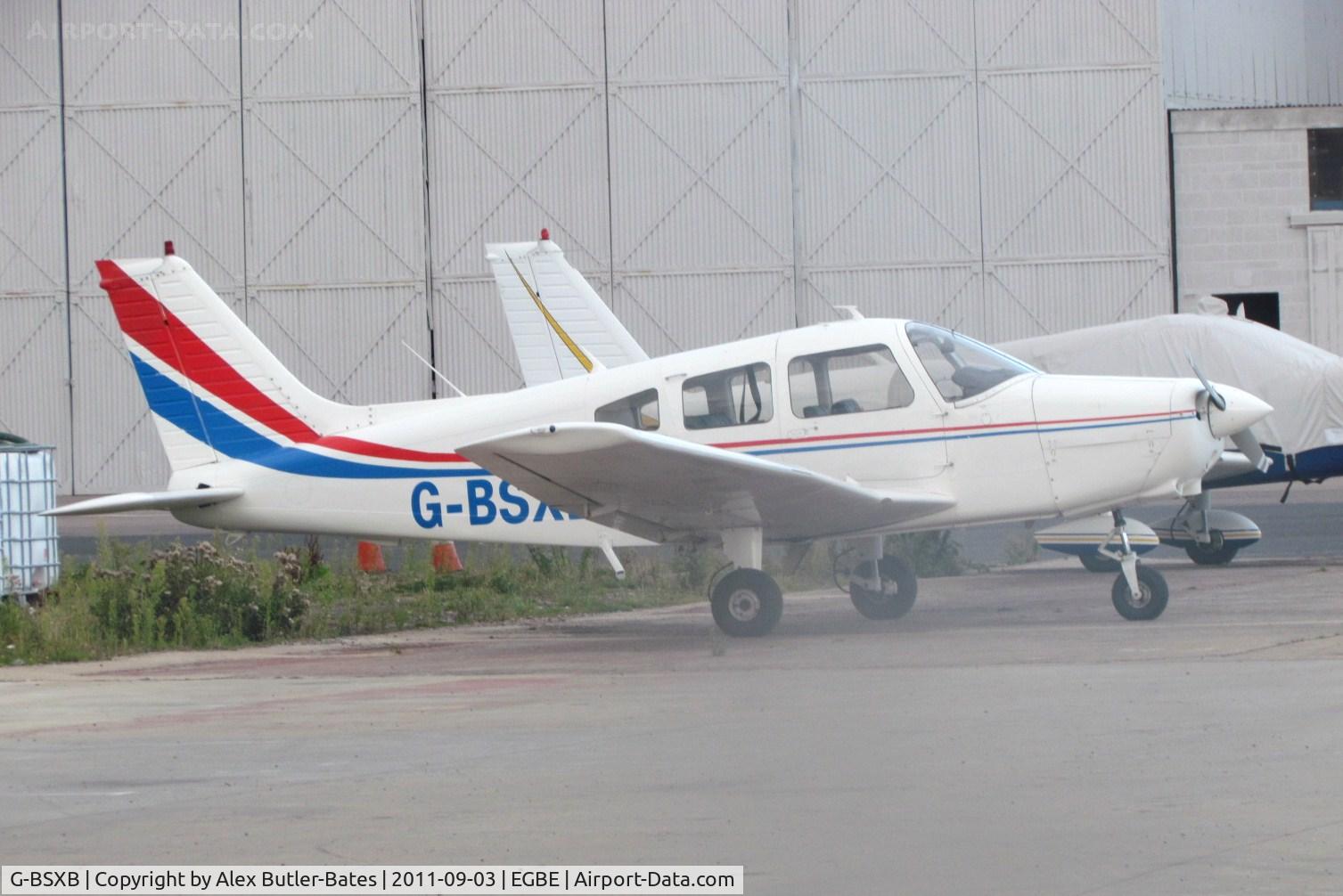 G-BSXB, 1984 Piper PA-28-161 Cherokee Warrior II C/N 28-8416125, Parked on the ramp