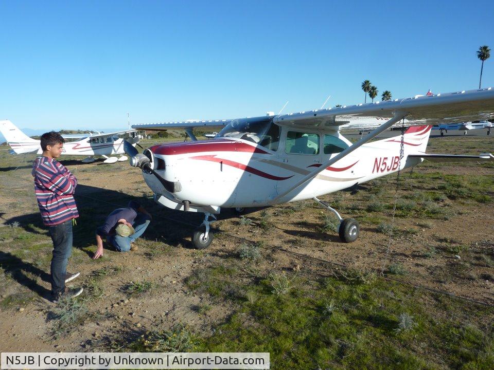 N5JB, 1979 Cessna TR182 Turbo Skylane RG C/N R18201283, Cessna gear up landing at Catalina Airport. Planes were circling the airport