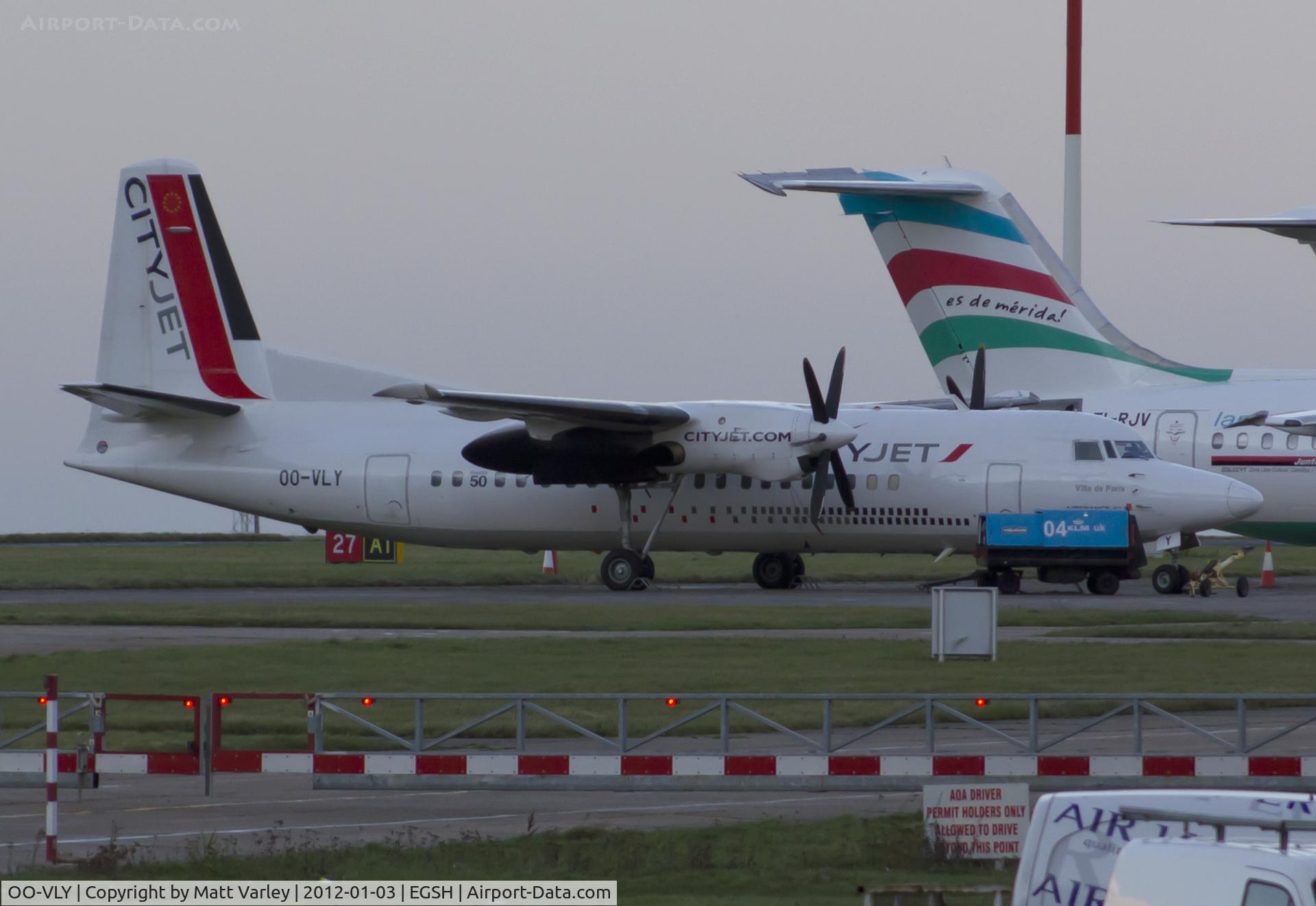 OO-VLY, 1990 Fokker 50 C/N 20181, Sat on stand 9 at EGSH.