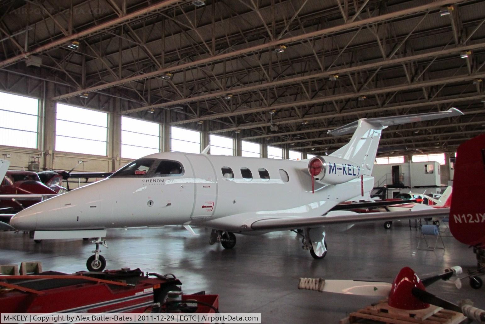 M-KELY, 2009 Embraer EMB-500 Phenom 100 C/N 50000040, Parked in the IAE hangar