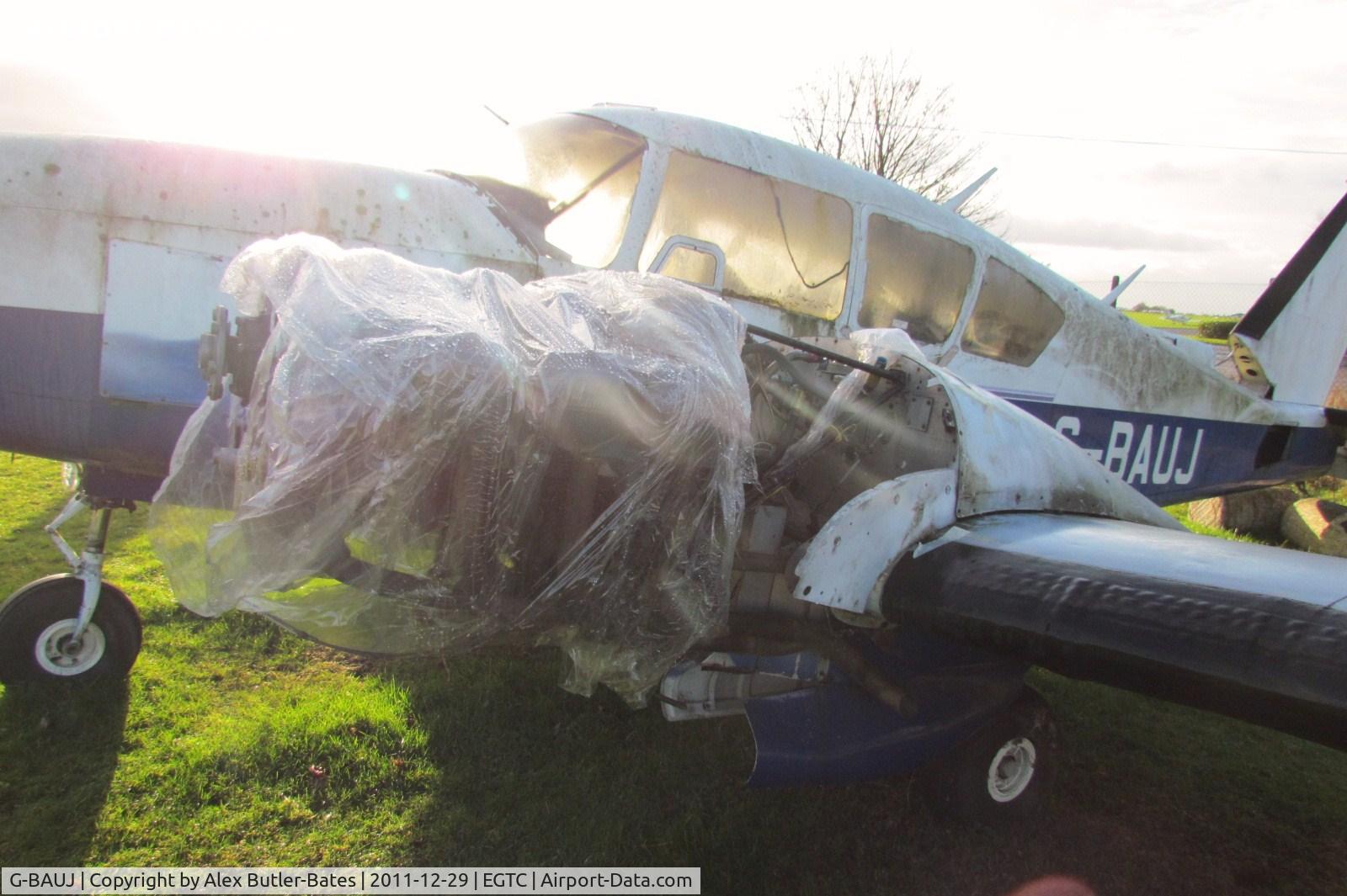 G-BAUJ, 1973 Piper PA-23-250 Aztec C/N 27-7304986, Now moved to the top of the airfield, lying derelict.