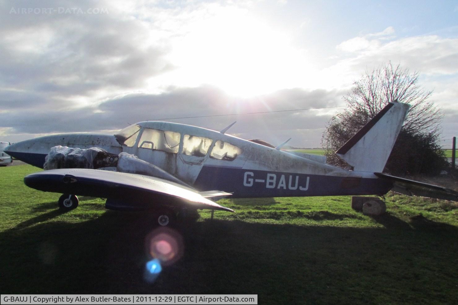 G-BAUJ, 1973 Piper PA-23-250 Aztec C/N 27-7304986, Now moved to the top of the airfield, lying derelict.