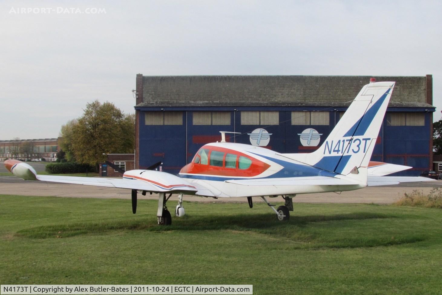 N4173T, 1965 Cessna 320D Executive Skyknight C/N 320D0073, Parked at the far end of the airfield