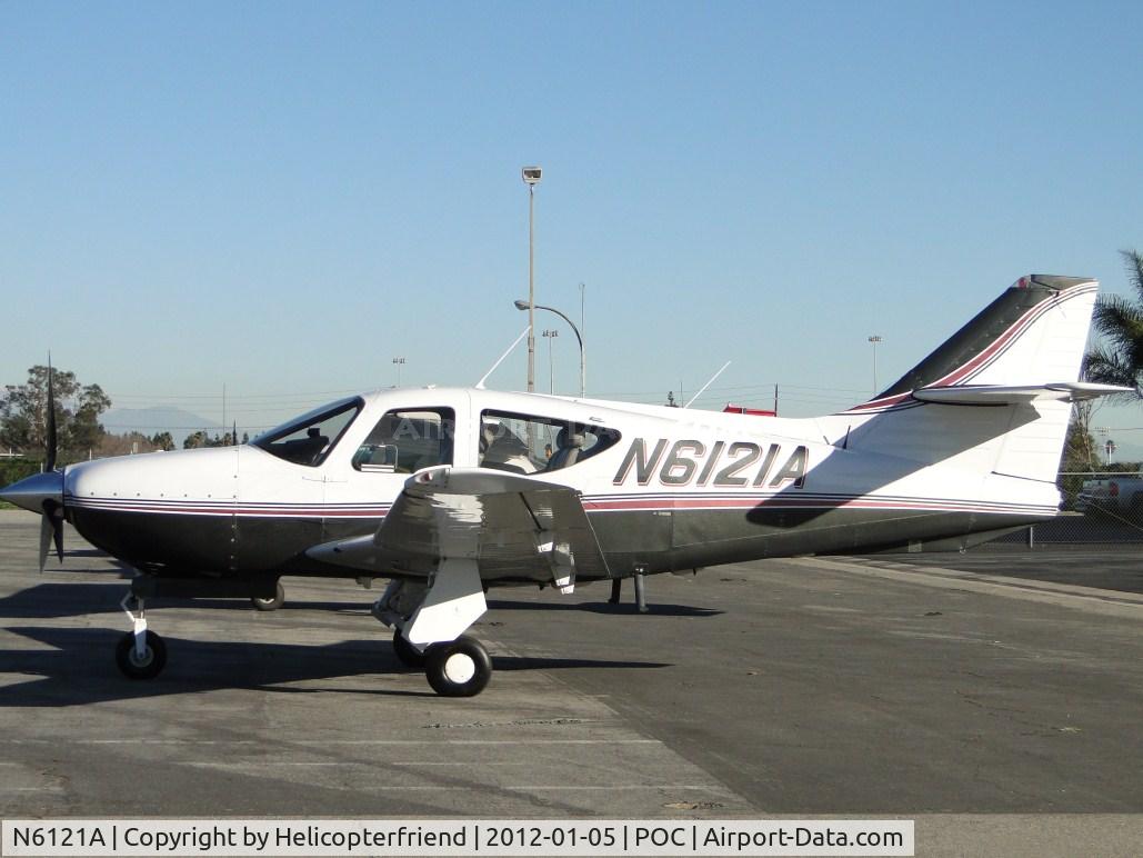 N6121A, 1998 Rockwell Commander 114TC C/N 20021, Parked near Howard Aviation