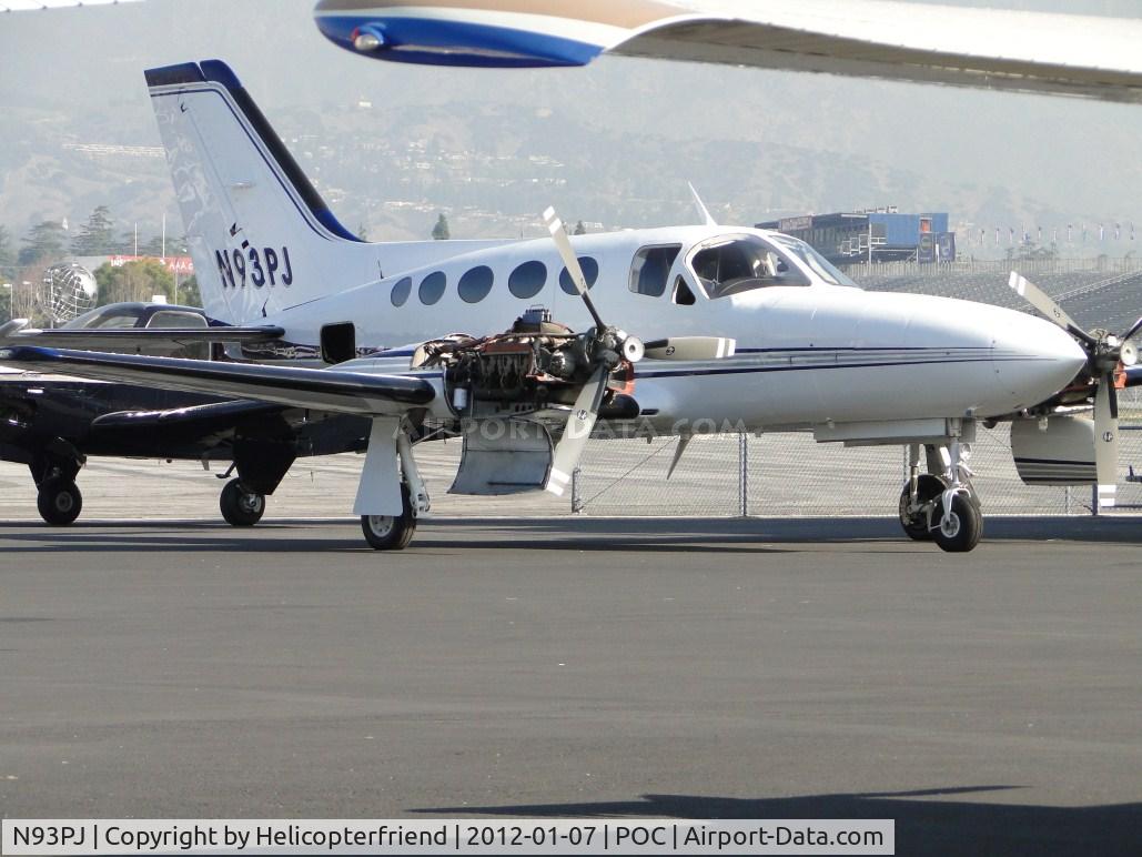 N93PJ, Cessna 421C Golden Eagle C/N 421C0824, Both engine cowlings opened and work being done, parked at Howard Aviation