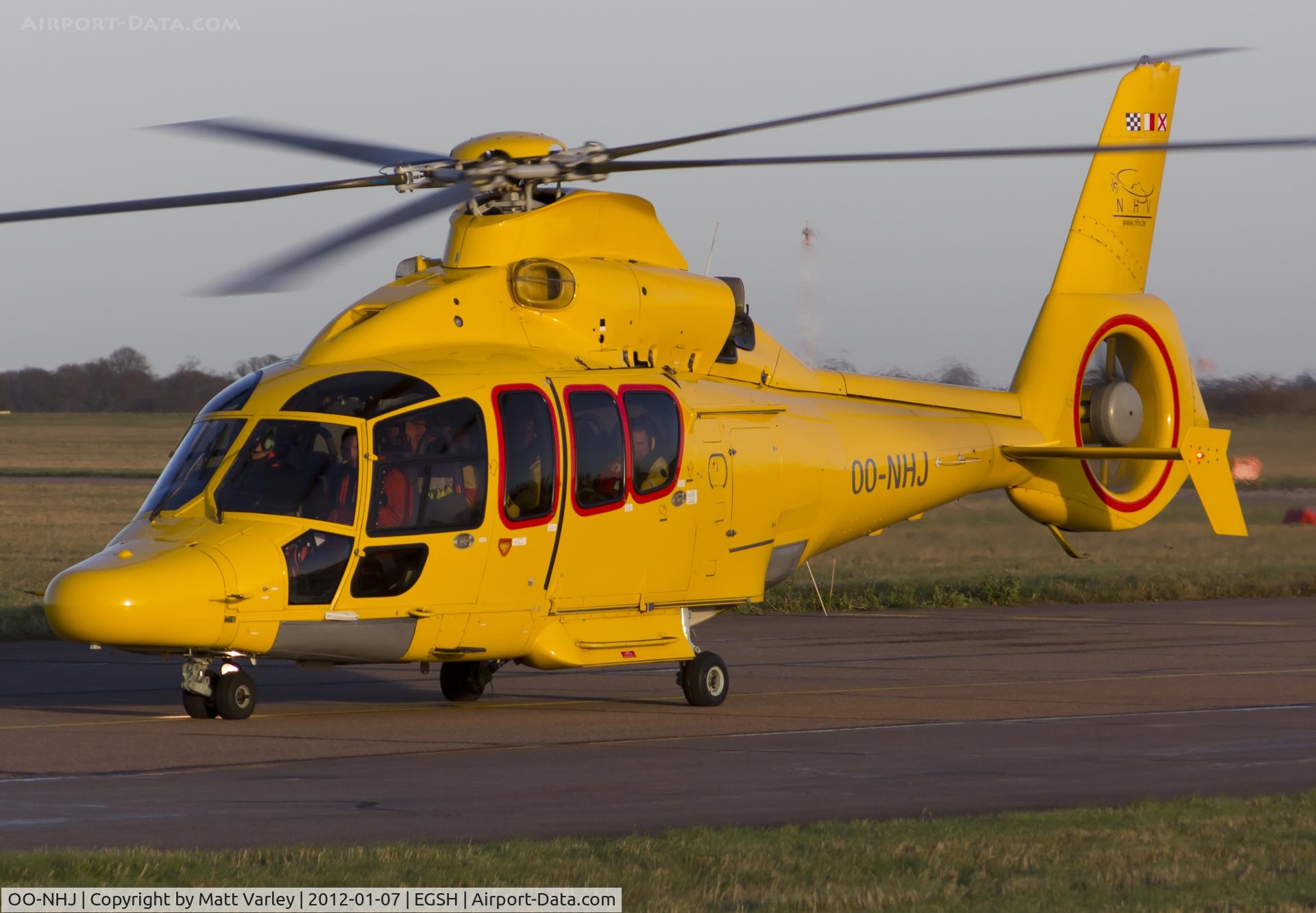 OO-NHJ, 2009 Eurocopter EC-155B-1 C/N 6842, Arriving at SaxonAir in the late afternoon sun.