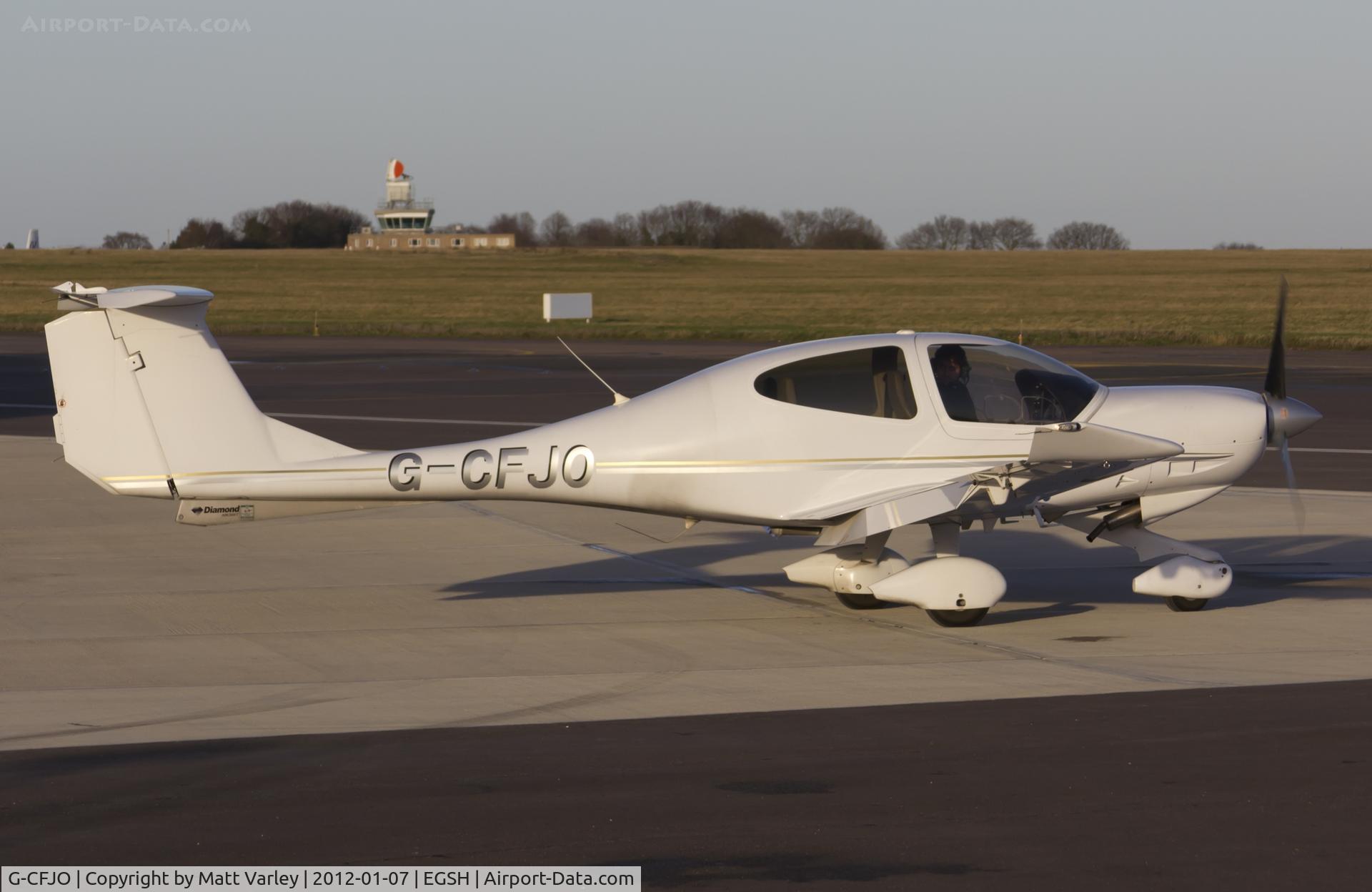 G-CFJO, 2007 Diamond DA-40D Diamond Star C/N D4.296, Sat on stand at SaxonAir in the late afternoon sun.