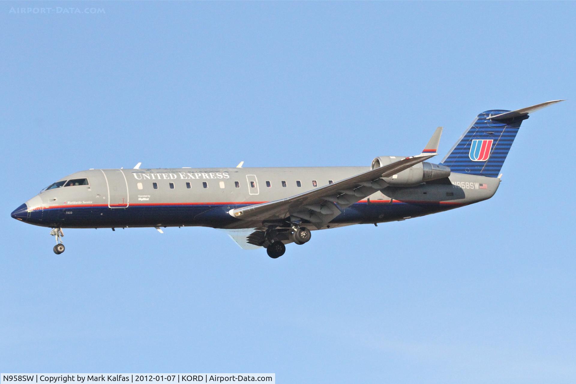 N958SW, 2003 Bombardier CRJ-200LR (CL-600-2B19) C/N 7833, SkyWest Bombardier CL-600-2B19, SKW6375 arriving from KCMX, RWY 28 approach KORD.