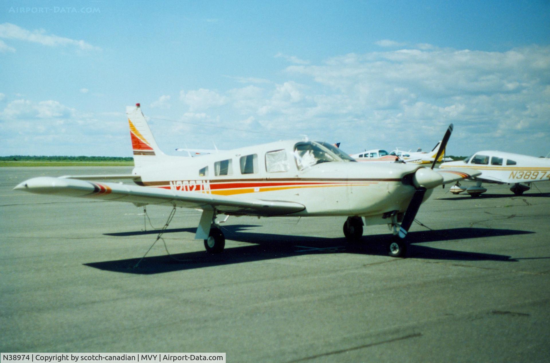 N38974, Piper PA-28-161 C/N 28-7716305, Piper PA-28-161 N38974 in background at Martha's Vineyard Airport, Vineyard Haven, MA - July 1986