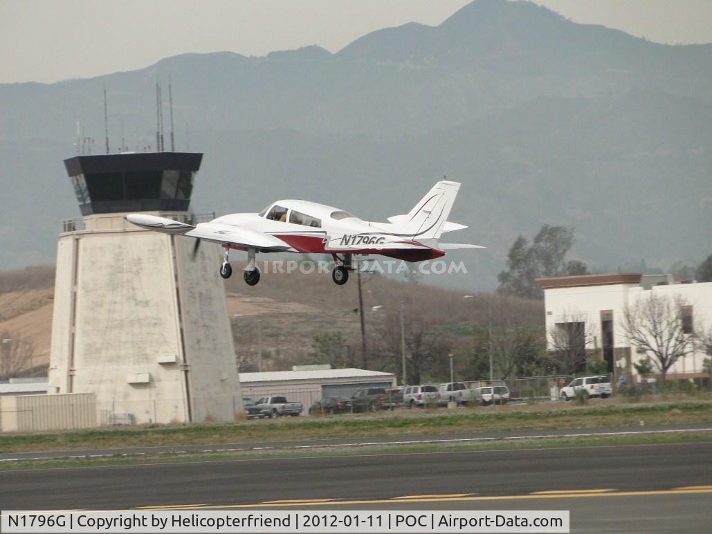 N1796G, 1975 Cessna 310R C/N 310R0048, Airbourne and climbing out just before passing the tower from runway 26L