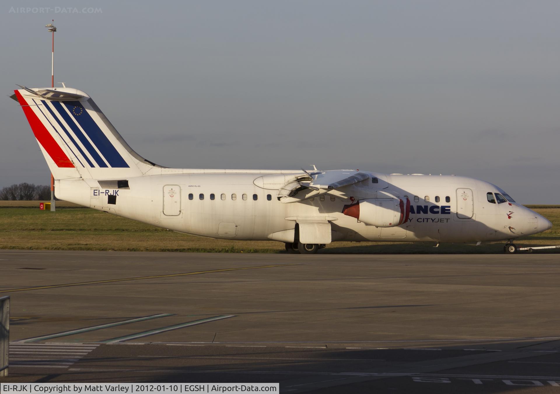 EI-RJK, 1999 British Aerospace Avro 146-RJ85A C/N E2348, Being towed to Air Livery hangar 3 for spray.