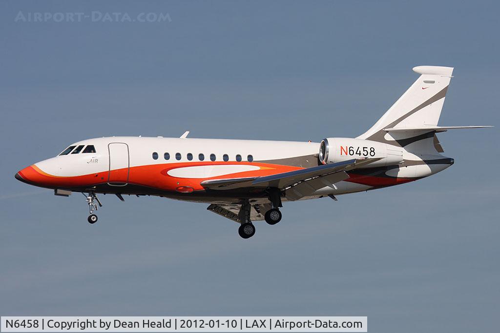 N6458, 2004 Dassault Falcon 2000EX C/N 26, Nike Inc 2004 Dassault Falcon 2000EX N6458 from Lakefront Airport (KNEW) - New Orleans, LA on short final to RWY 25L. Tail number of this aircraft was recently changed from N6453 to N6458.