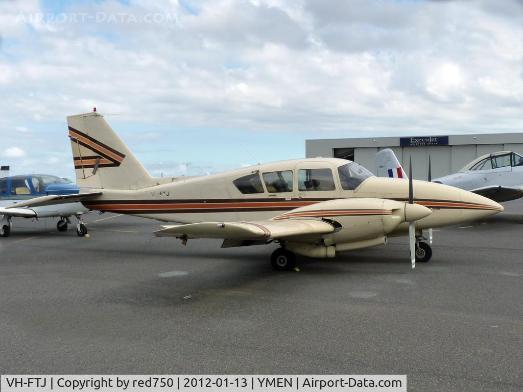 VH-FTJ, 1979 Piper PA-23-250 Aztec F C/N 27-7854088, This Aztec needs some attention - part of engine cowling missing.