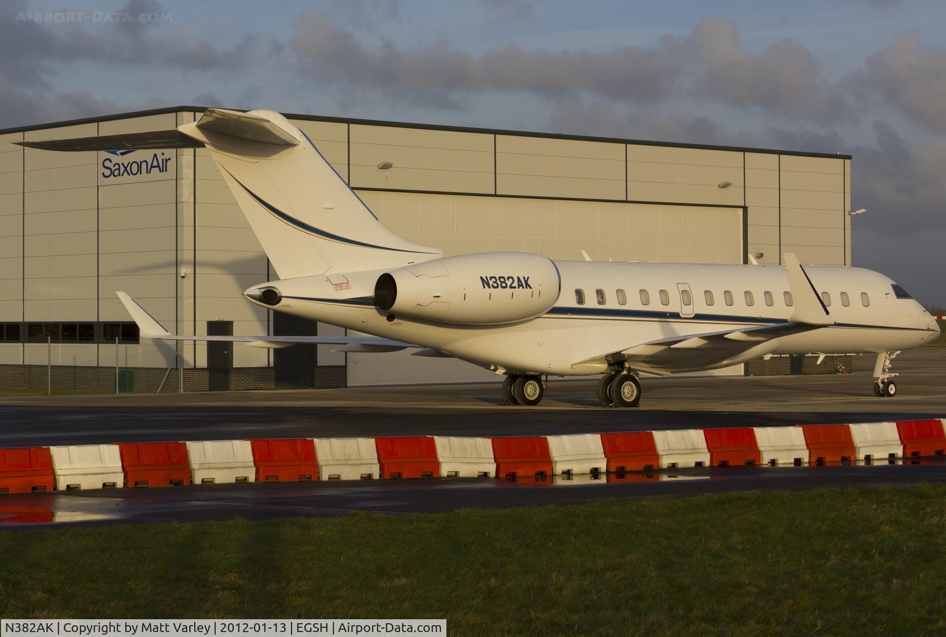 N382AK, 2005 Bombardier BD-700-1A10 Global Express XRS C/N 9181, A nice visitor from chicago sat on stand at SaxonAir in the early morning sun.