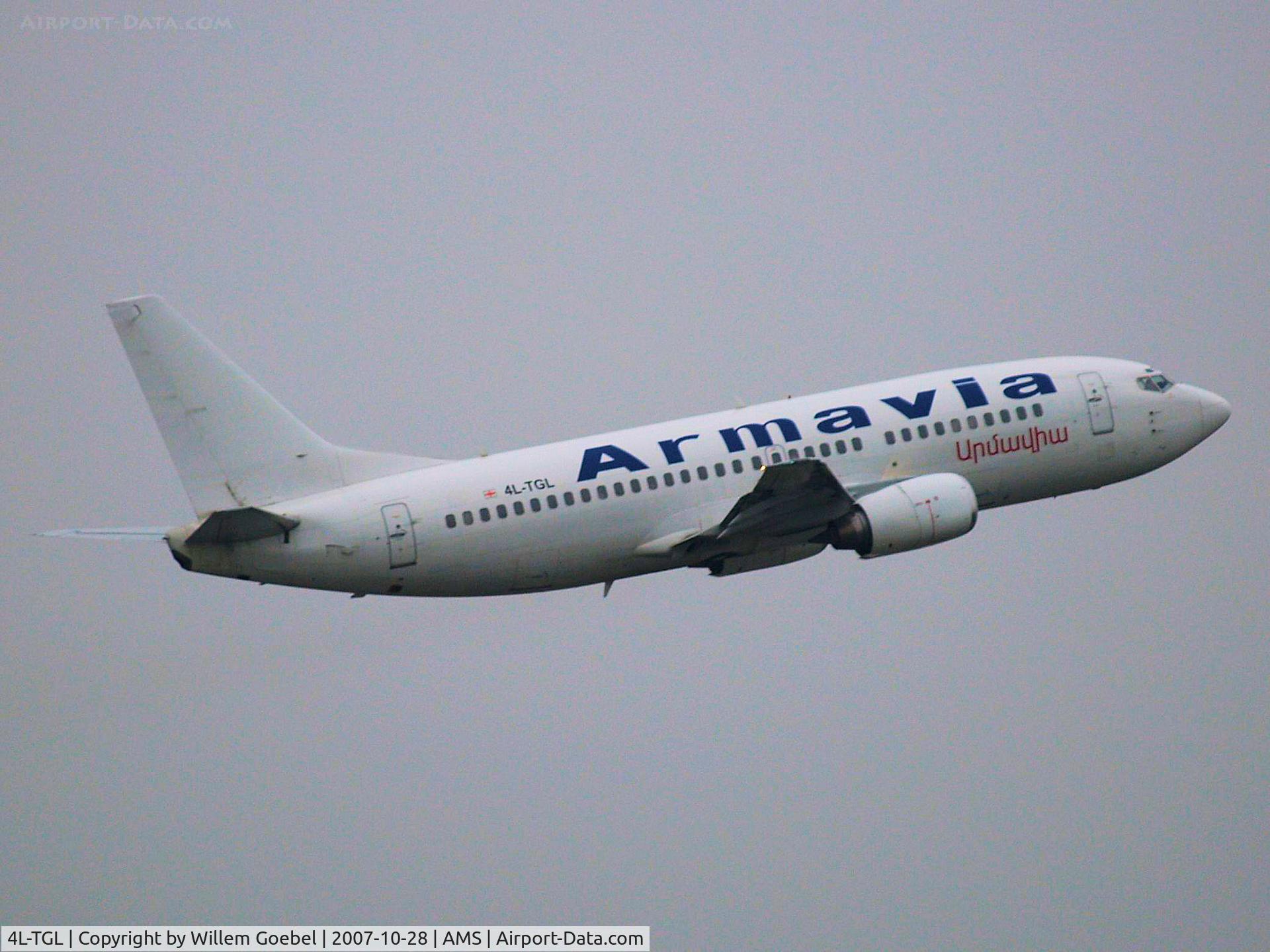 4L-TGL, 1988 Boeing 737-3B7 C/N 23859, Take off from runway L36 of Amsterdam Airport