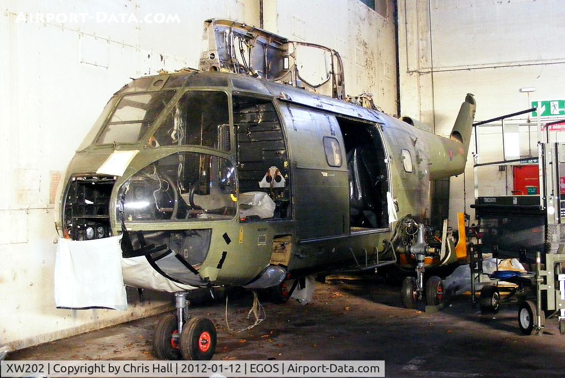 XW202, 1971 Westland Puma HC.1 C/N 1061/F9749, inside the Aircraft Maintenance & Storage Unit hangar