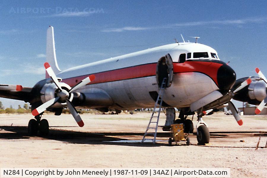 N284, Douglas DC-7C Seven Seas C/N 45203, Chandler Memorial Airport, AZ - scanned from a print