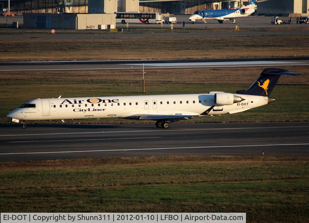 EI-DOT, 2006 Canadair CRJ-900LR (CL-600-2D24) C/N 15066, Backtracking rwy 32L to the Terminal...
