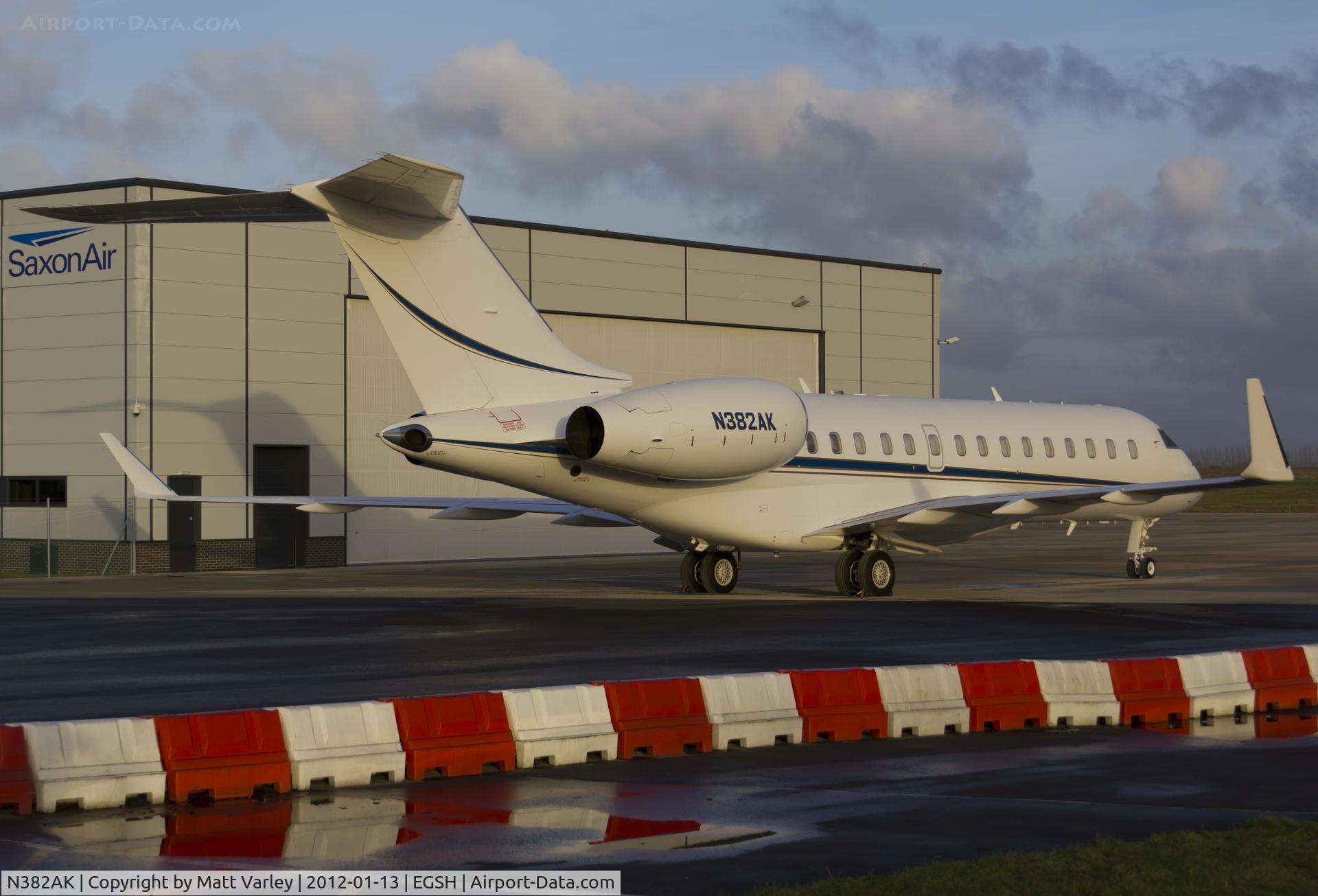 N382AK, 2005 Bombardier BD-700-1A10 Global Express XRS C/N 9181, A nice visitor from Chicago sat on stand at SaxonAir in the early morning sun.