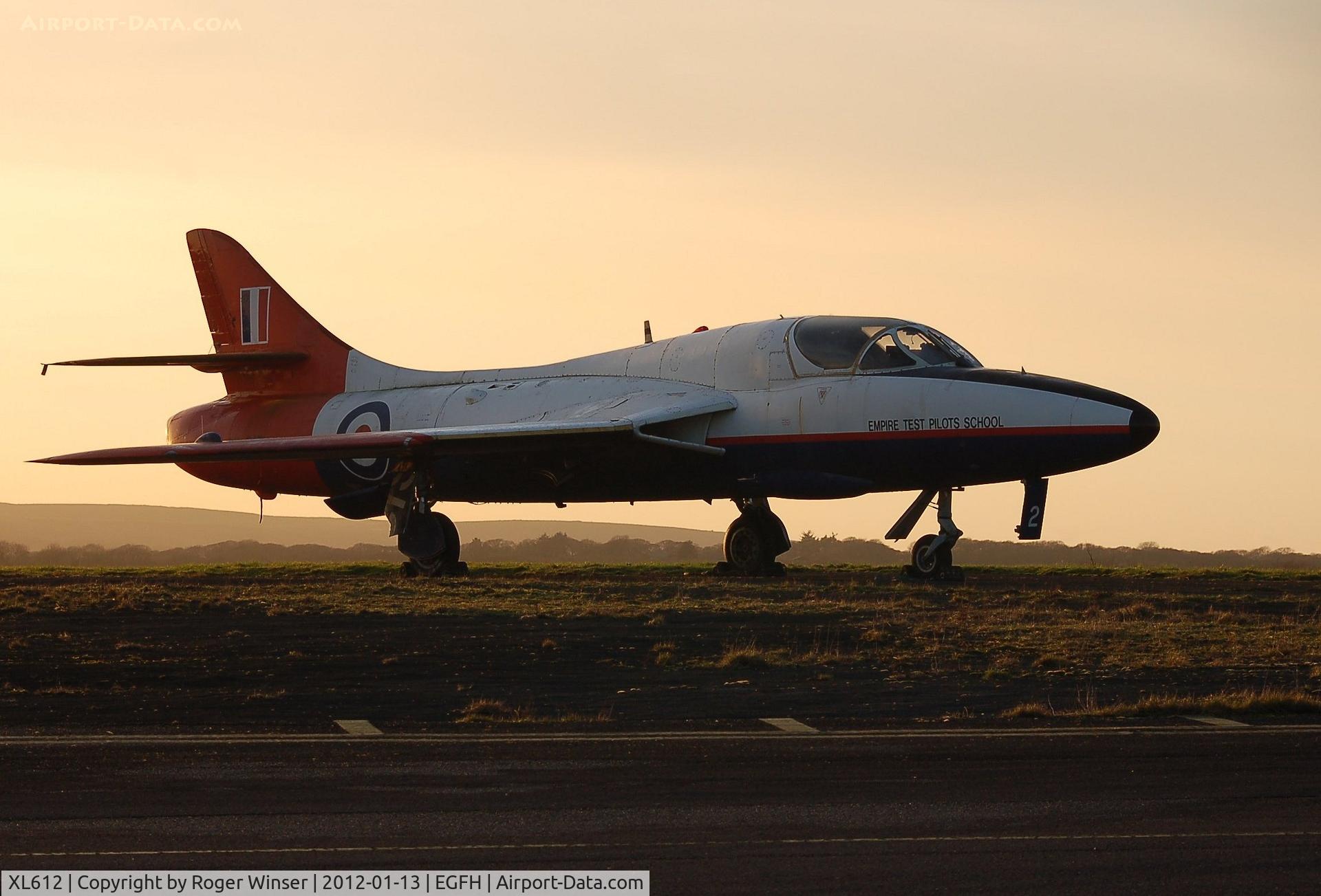 XL612, 1958 Hawker Hunter T.7 C/N 41H-695346, Seen at dusk, Hunter Flying Ltd's Hawker Hunter T.7 on loan to the airport for 2 to 3 years.