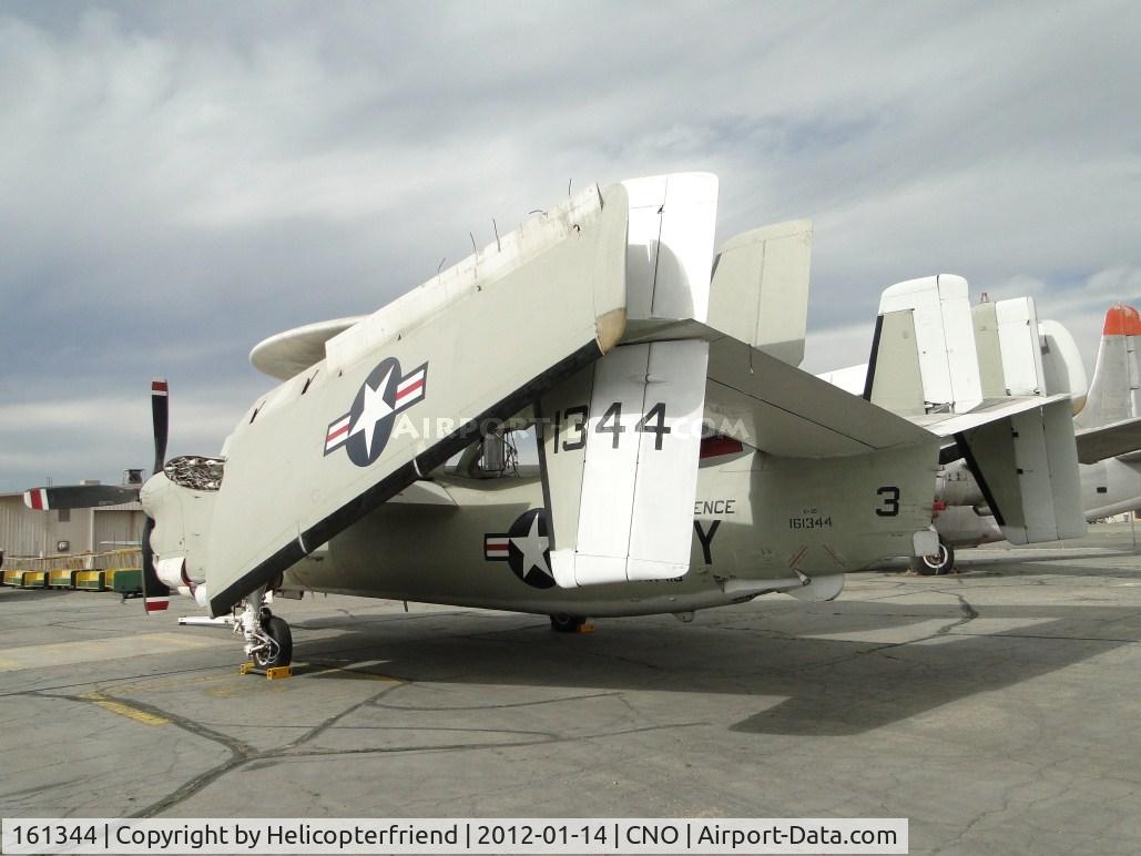 161344, Grumman E-2C Hawkeye C/N A075, Parked out back of Yank's Air Museum, with wings folded back