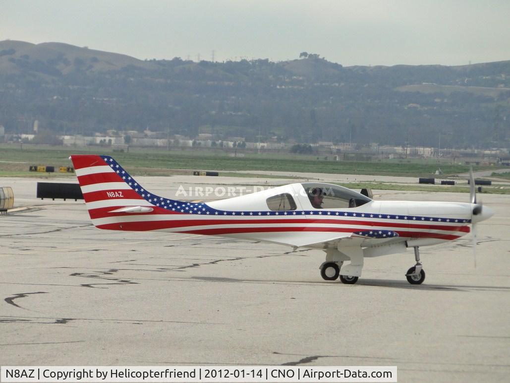 N8AZ, Lancair 360 C/N 327, Beautifully colored ship pulling into the parking area to watch the EC-121 