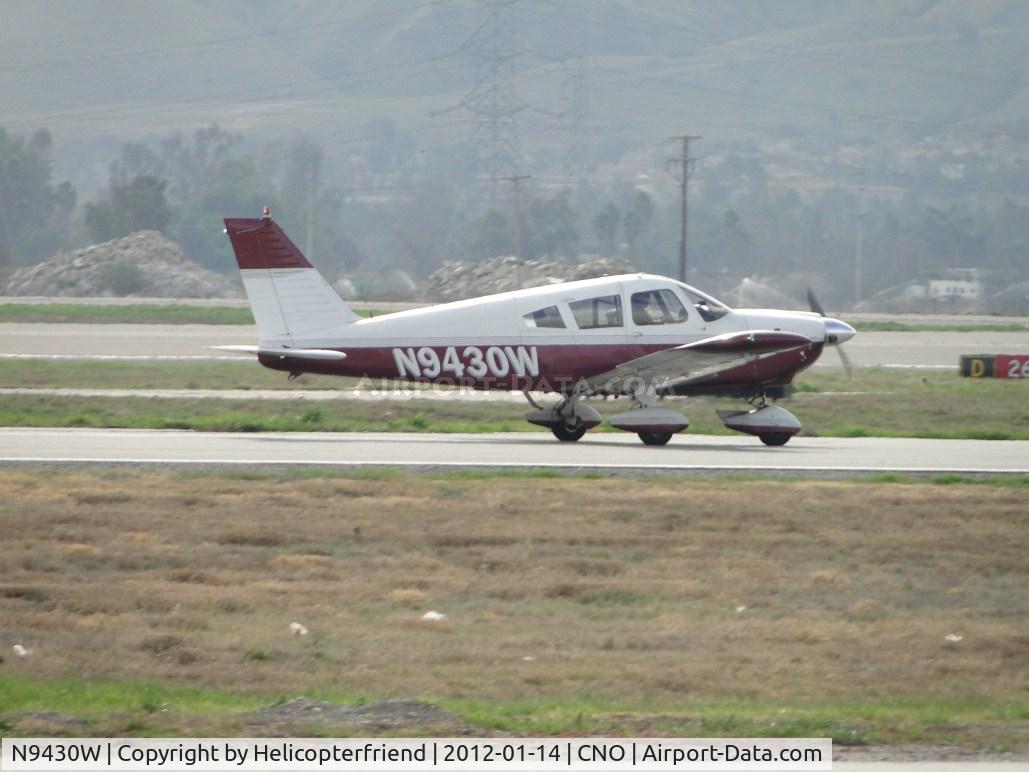 N9430W, 1968 Piper PA-28-235 C/N 28-11136, Rolling out after landing on runway 26R
