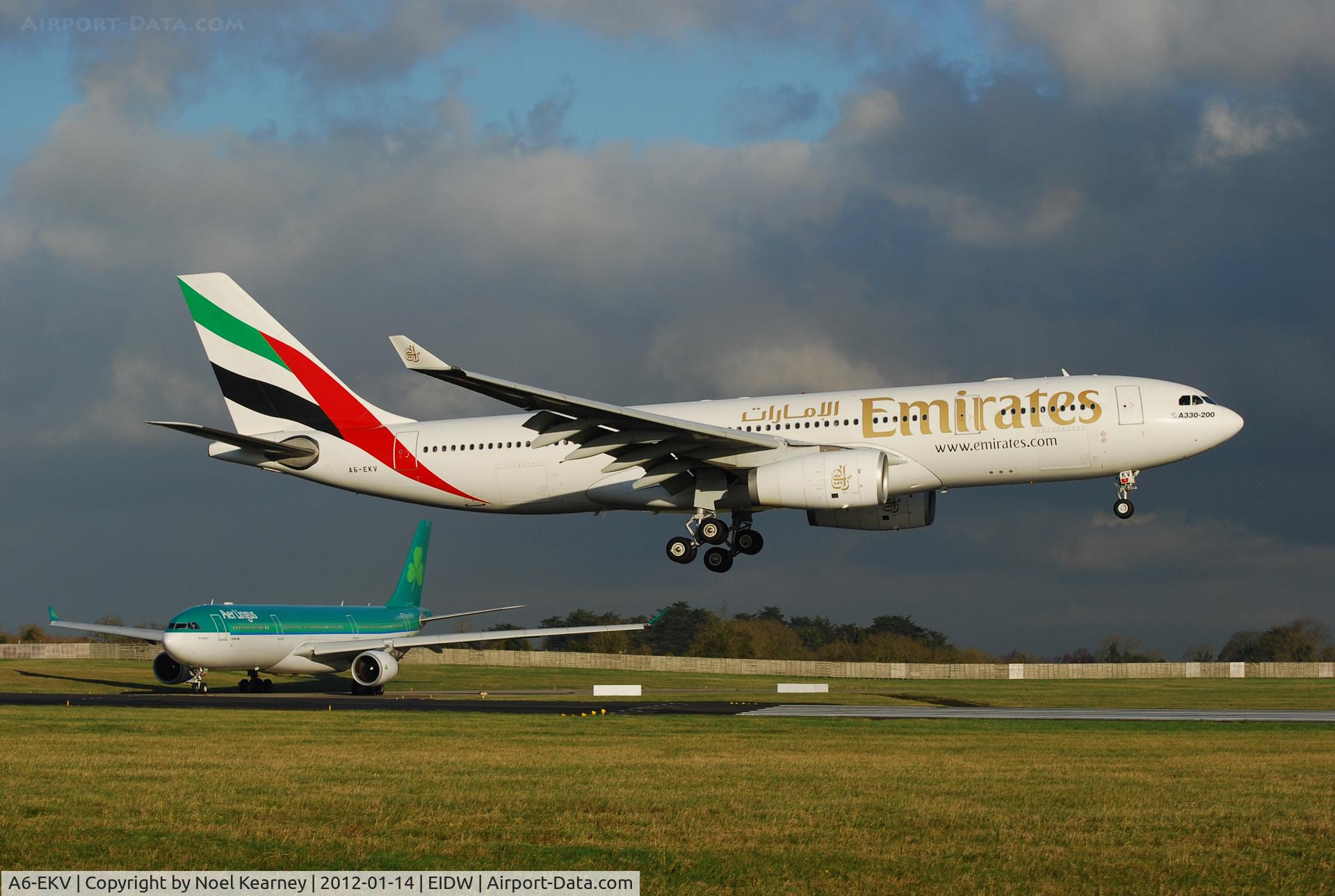 A6-EKV, 1999 Airbus A330-243 C/N 314, UAE 161 landing from DUBAI, with EIN waiting to depart to KJFK