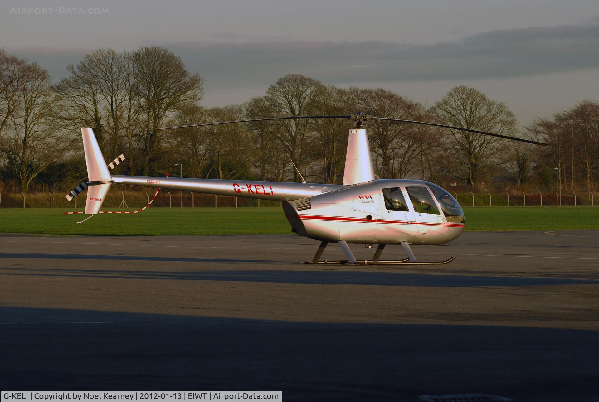 G-KELI, 2006 Robinson R44 Raven II C/N 11040, R.44 Parked on the ramp at Weston
