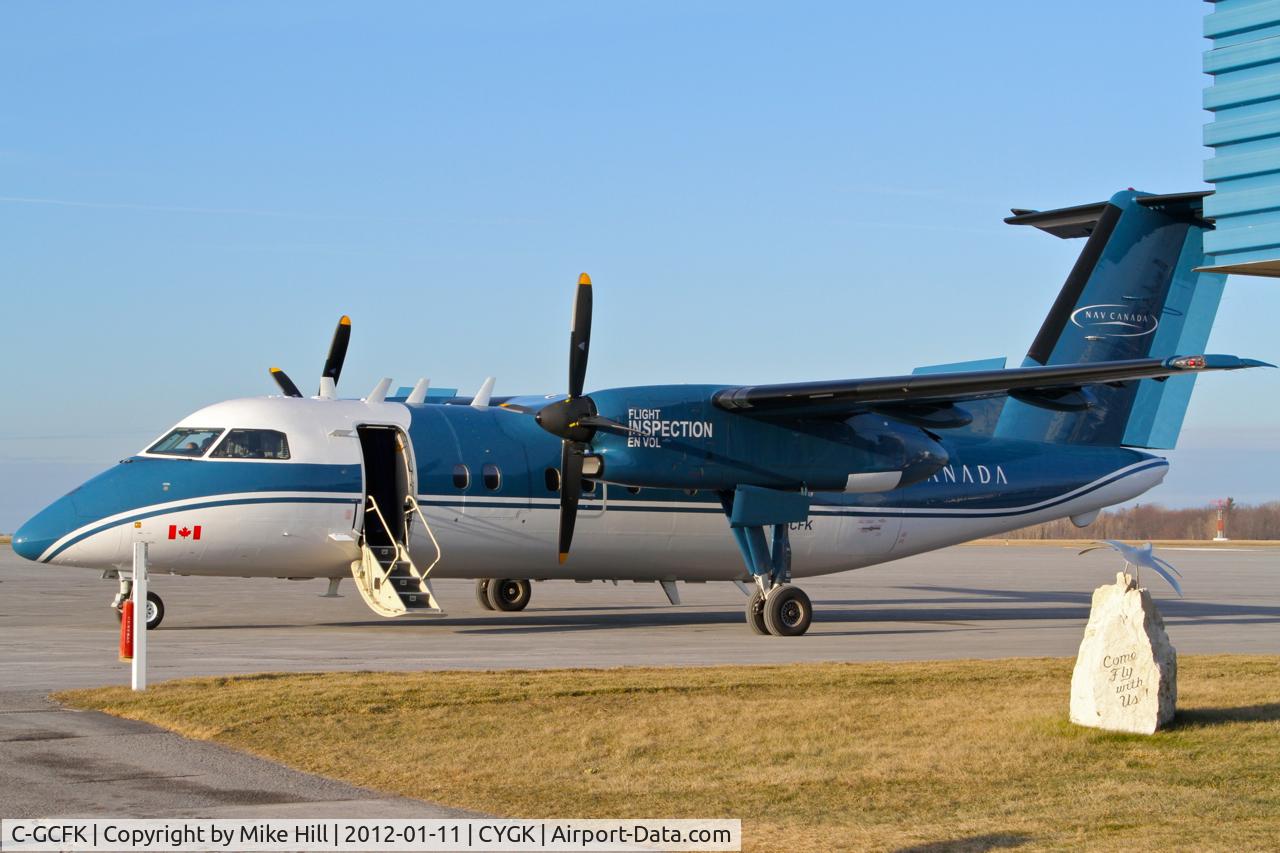 C-GCFK, 1985 De Havilland Canada DHC-8-102 Dash 8 C/N 028, Nav Canada aircraft visiting CYGK (Kingston, Ontario) to conduct aerial examinations of installed navigation systems at the airport on Jan 11, 2012
