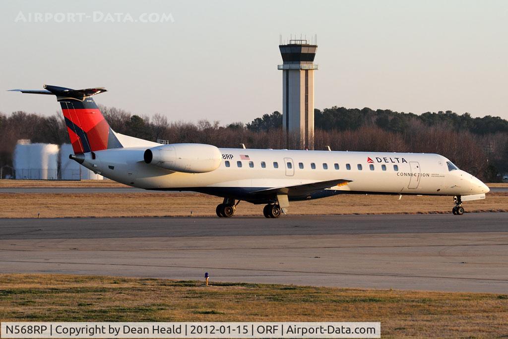 N568RP, 2004 Embraer EMB-145LR C/N 145800, Delta Connection (Chautauqua Airlines) N568RP (FLT CHQ6042) taxiing to the gate after arrival from Boston Logan Intl (KBOS) on RWY 5. This aircraft, the 800th ERJ, no longer has the 