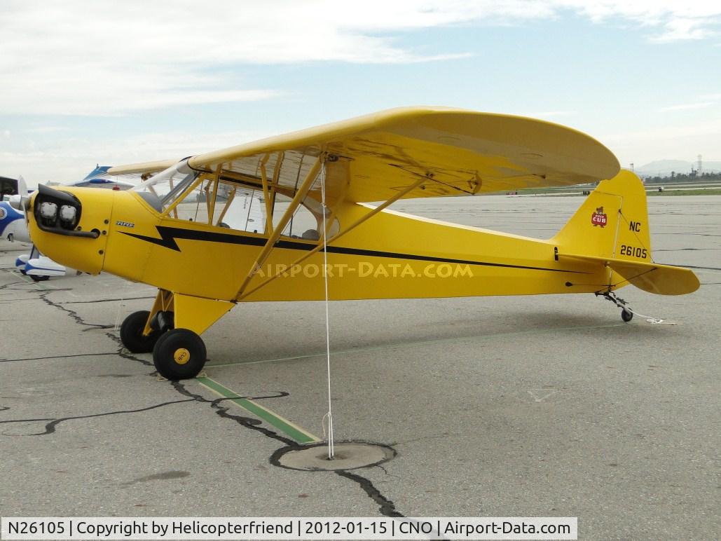 N26105, Piper J3C-65 Cub Cub C/N 4051, Parked for static display southwest of the tower