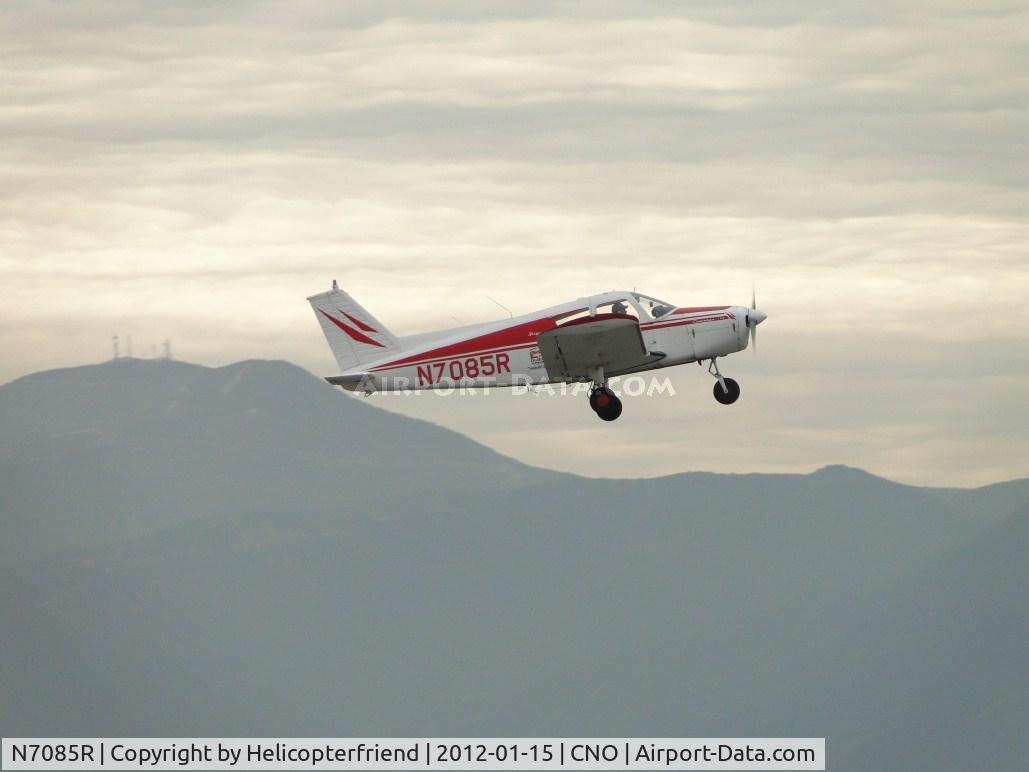 N7085R, 1966 Piper PA-28-140 Cherokee C/N 28-21788, Lifting off from runway 26R on a hazy day