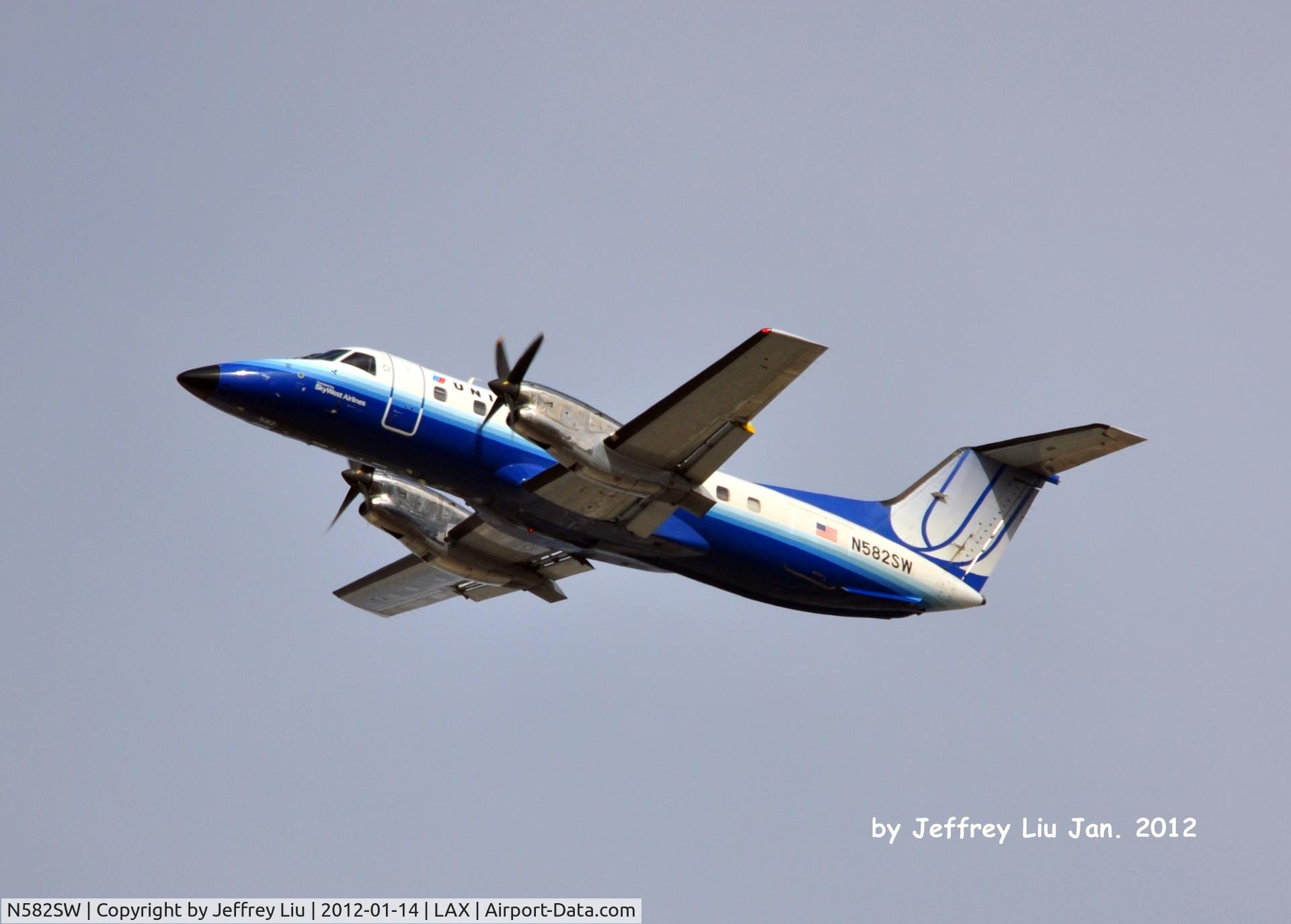 N582SW, 1999 Embraer EMB-120ER Brasilia C/N 120350, Tookoff from LAX