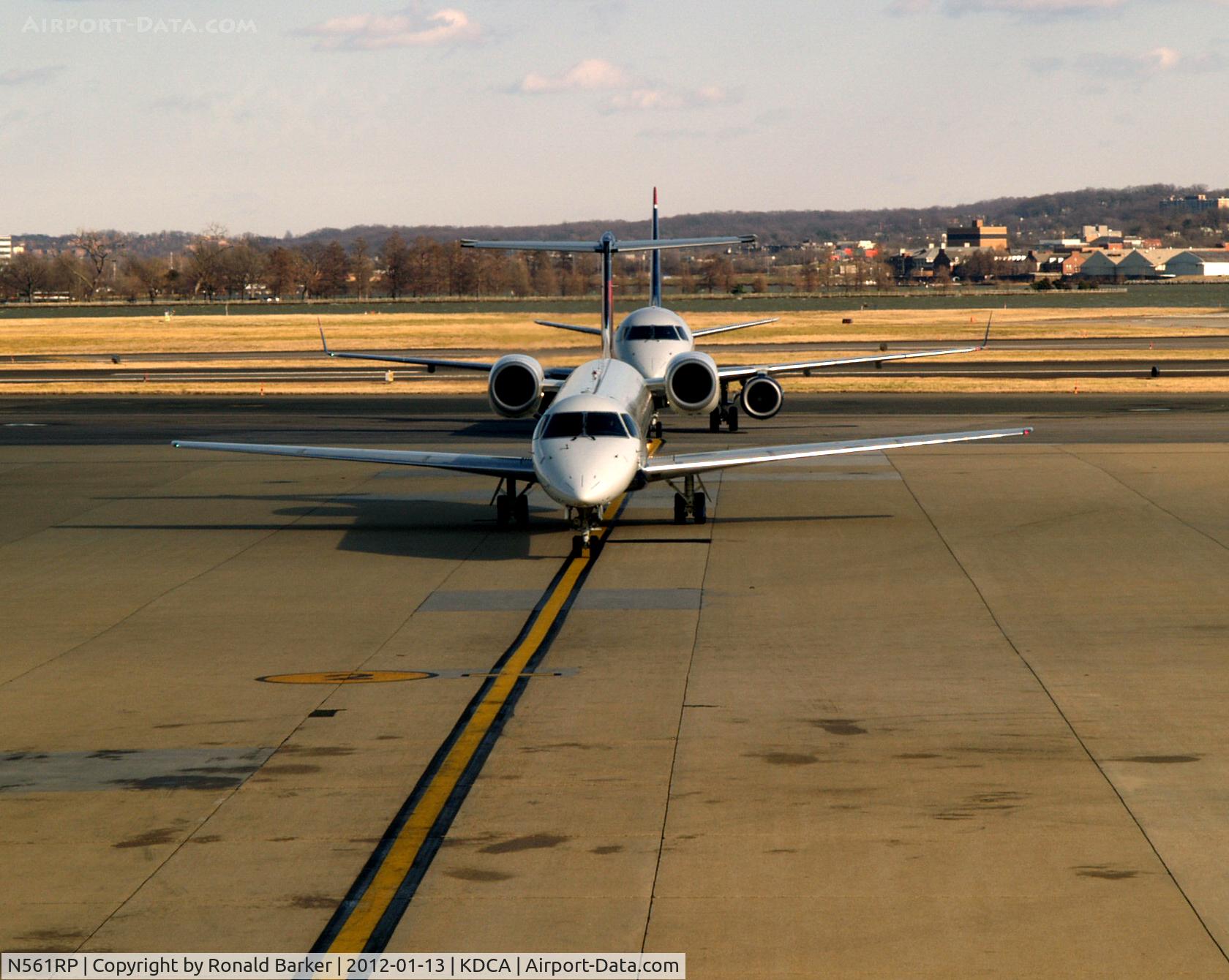 N561RP, 2002 Embraer ERJ-145LR (EMB-145LR) C/N 145447, N561RP followed by N123HQ
