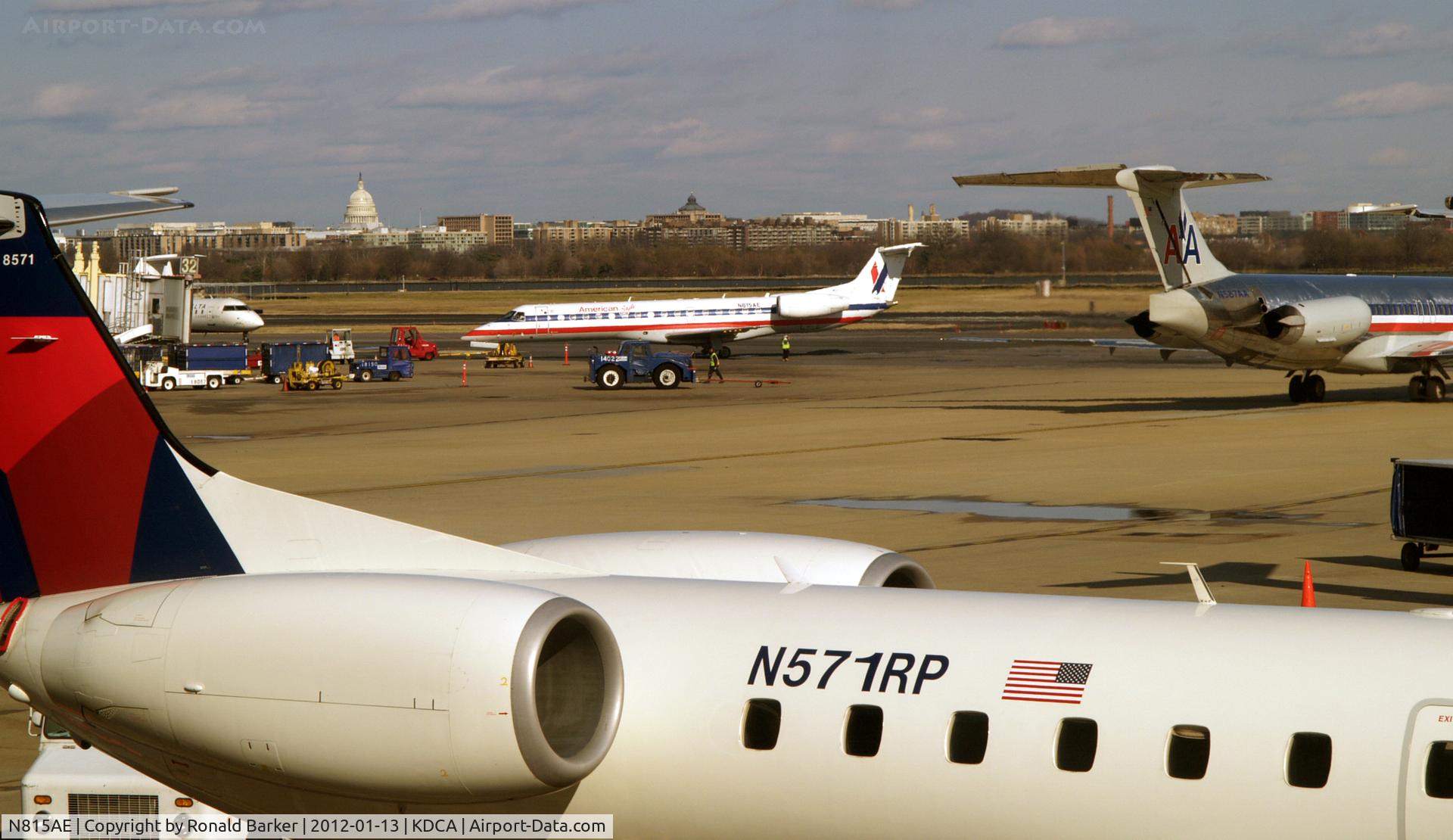 N815AE, 2002 Embraer ERJ-140LR (EMB-135KL) C/N 145545, N571RP in the forground, N815AE in the distance.  Note the US Captol in the far distance.