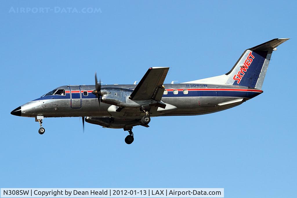 N308SW, 1997 Embraer EMB-120ER Brasilia C/N 120-326, SkyWest Airlines N308SW (FLT SKW5474) from McClellan-Palomar (KCRQ) on short final to RWY 25L.
