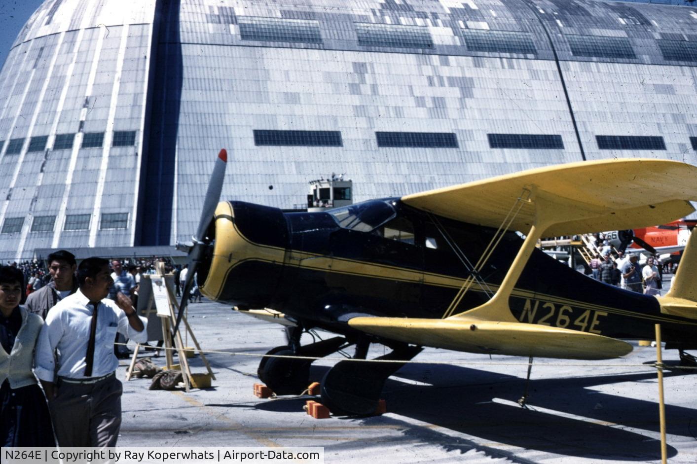N264E, 1943 Beech D17S Staggerwing C/N 4888, Photo taken at the 50th Naval Aviation Anniversary at Moffett Field California. Hanger 1 is in the Backround.
