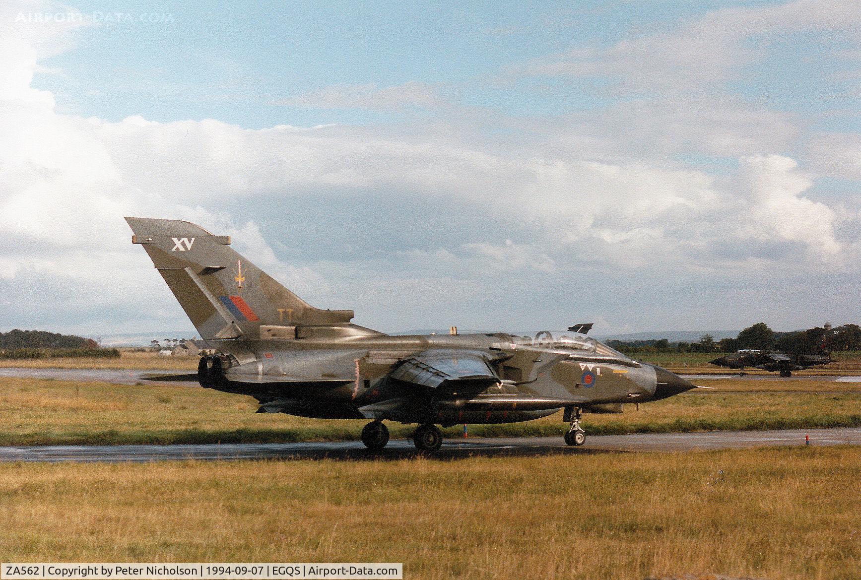 ZA562, 1981 Panavia Tornado GR.1(T) C/N 085/BT021/3046, Tornado GR.1, callsign Mitre 2,  of 15(Reserve) Squadron awaiting clearance to join the active runway at RAF Lossiemouth in September 1994.