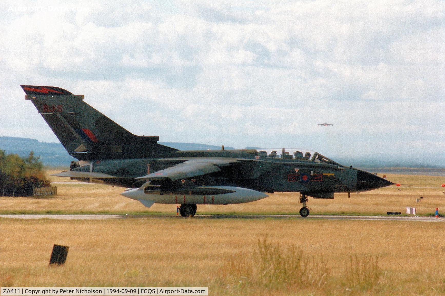 ZA411, 1983 Panavia Tornado GR.1 C/N 229/BT035/3110, Tornado GR.1 of 617 Squadron awaiting clearance to join Runway 23 at RAF Lossiemouth in September 1994.