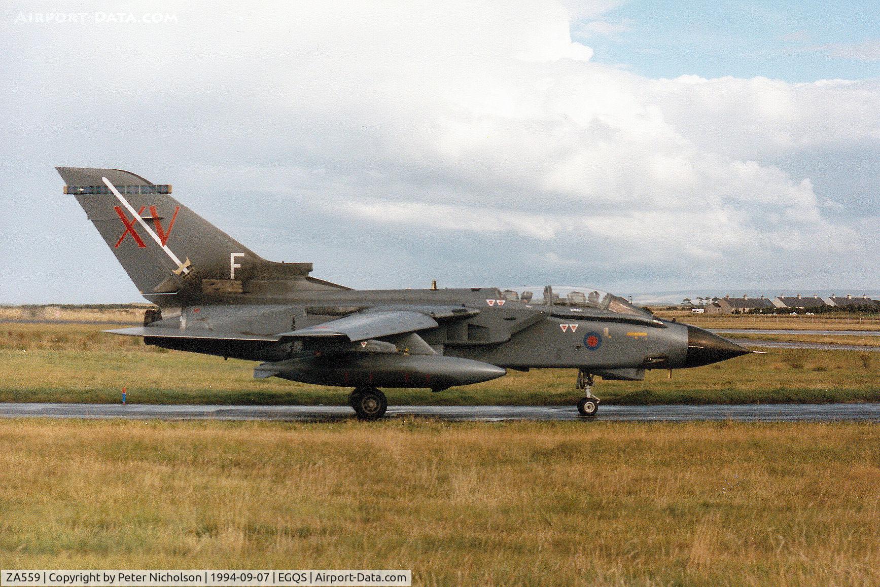ZA559, 1981 Panavia 081/BS023/3043 C/N 081/BS023/3043, Tornado GR.1, callsign Mitre 3, of 15(Reserve) Squadron awaiting clearance to join Runway 05 at RAF Lossiemouth in September 1994.