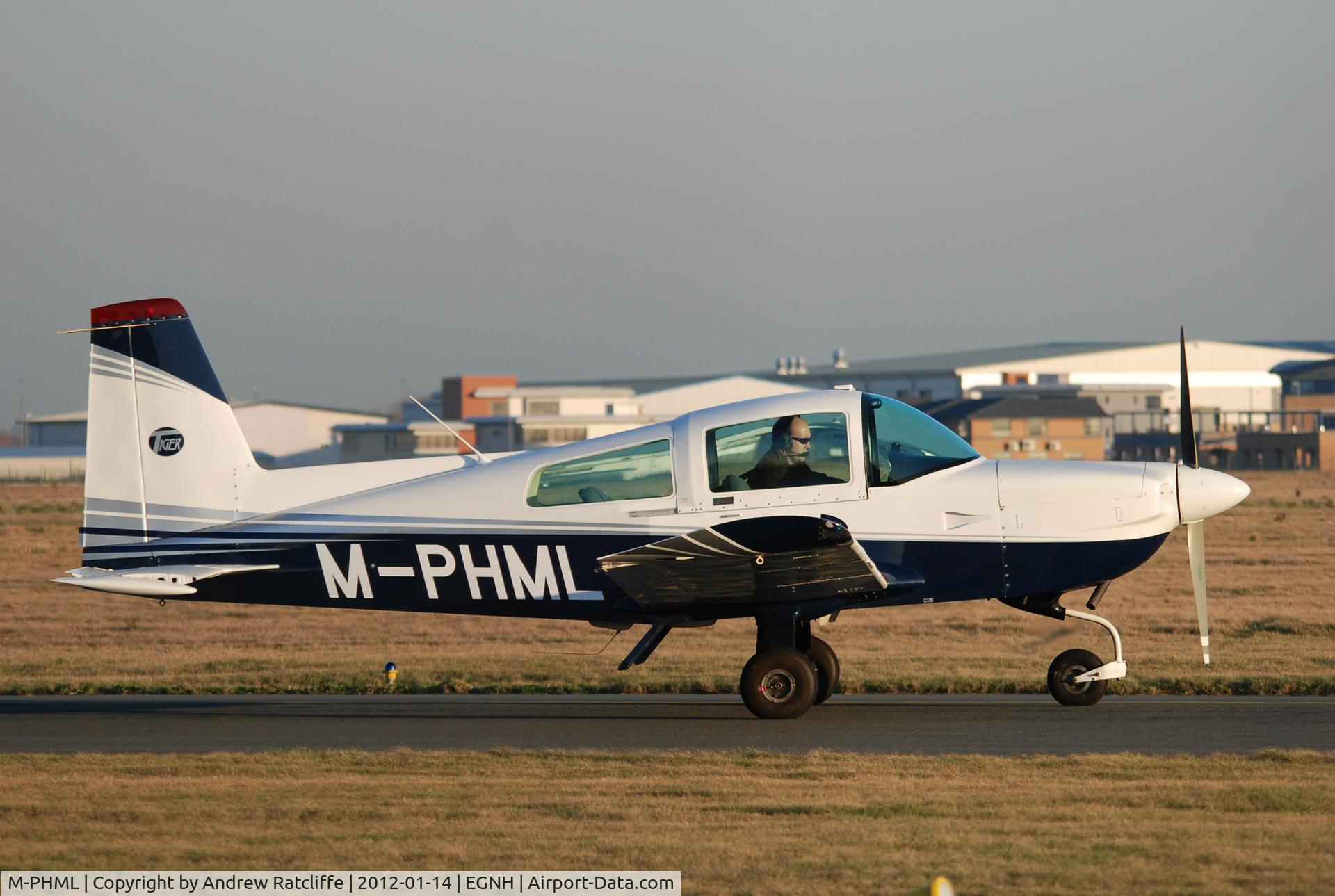 M-PHML, 1992 American General AG-5B Tiger C/N 10141, Photographed taxiing out for departure from Blackpool Airport, Lancashire back to the Isle of Man on Saturday 14th january 2012