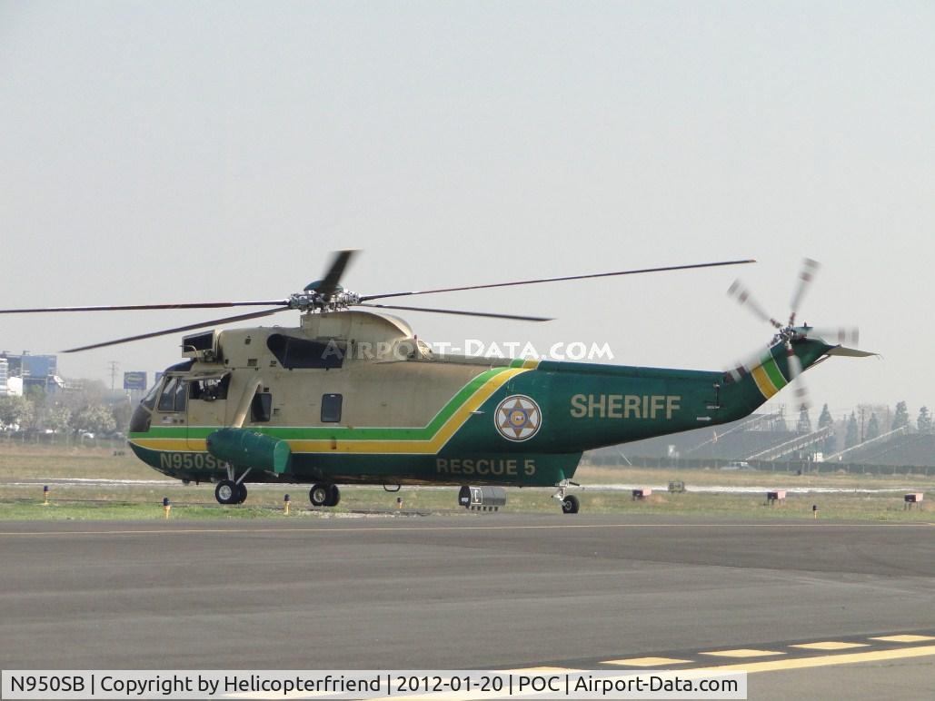 N950SB, Sikorsky SH-3H Sea King C/N 61372, Taxiing onto taxiway Cocco waiting for take off from runway 26L
