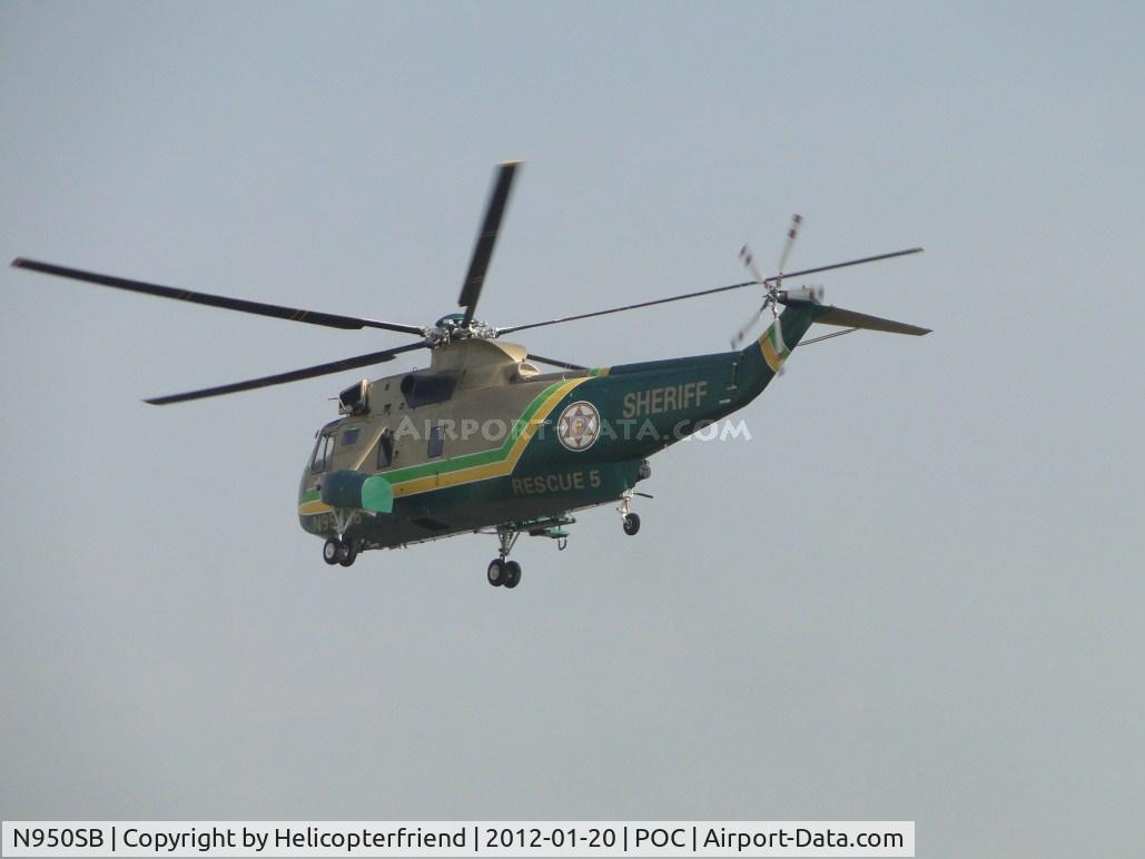 N950SB, Sikorsky SH-3H Sea King C/N 61372, Gaining forward momentum and leaving northbound crossing runway 26R